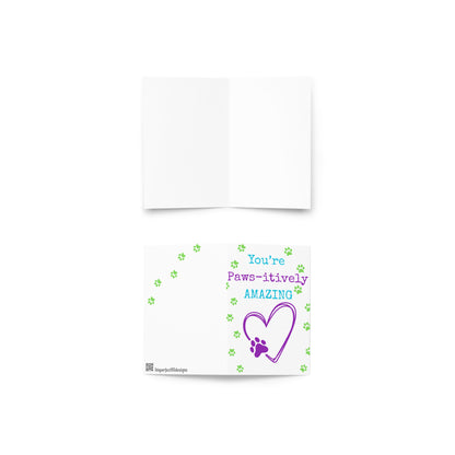 Card with 'You're Paws-itively Amazing' text and paw print on a white background