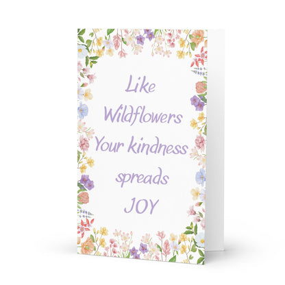 Greeting card with floral design and text on a white background