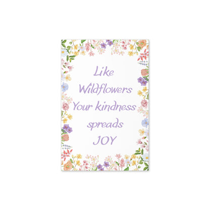 Notebook with floral design and text on a white background
