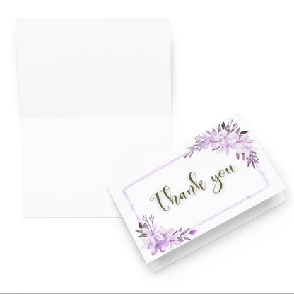 Card with 'Thank you' text and floral design on a white background