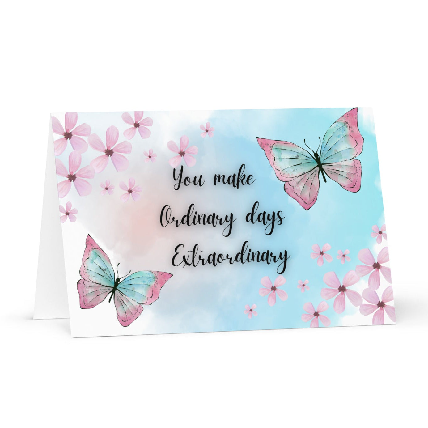Card with butterflies and floral design on a light blue background