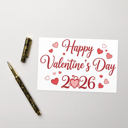 Valentine's Day card with 'Happy Valentine's Day 2026' text and decorative pen on a light gray background
