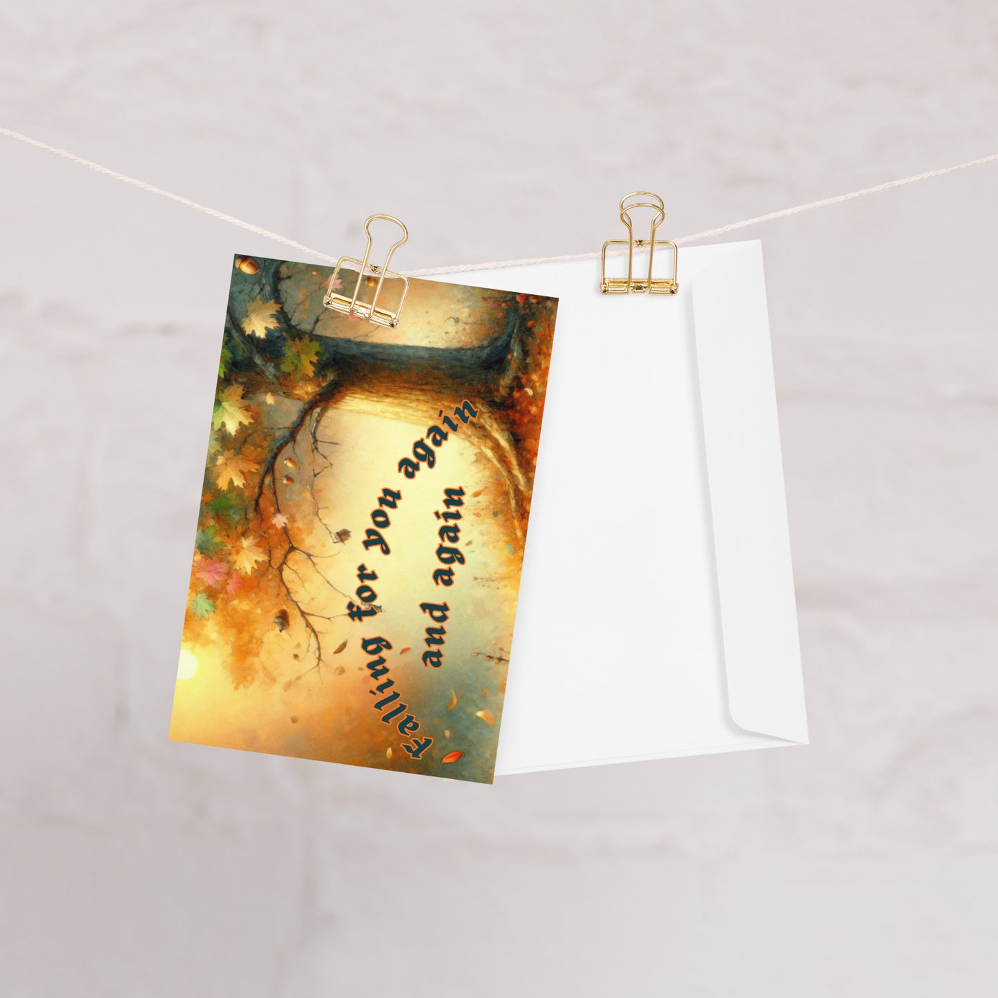 Greeting card with autumn design and envelope on a white background