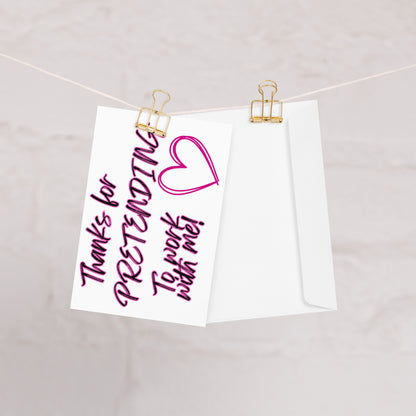 White paper with pink text and heart graphic on a white background